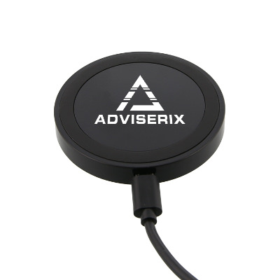 Black plastic charging pad with a branded logo.