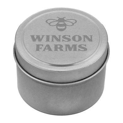 Silver tin candle with a personalized logo.
