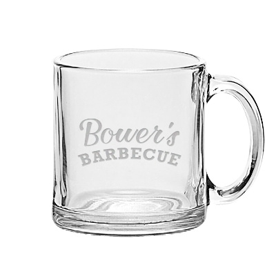 Clear coffee mug with engraved logo.