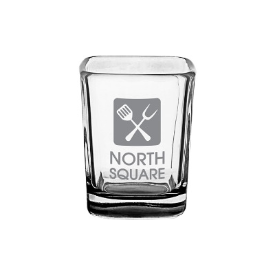 Black shot glass with custom logo.