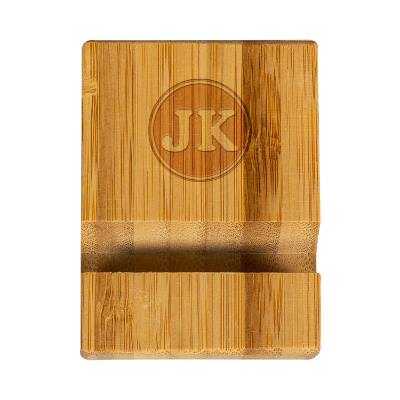 Engraved bamboo phone stand.