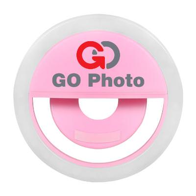 Pink plastic selflie light with a customizable logo.