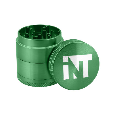 Green metal grinder with custom logo.