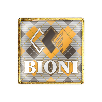 Gold brass lapel pin with a custom imprint.