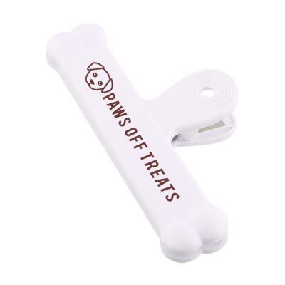 Polystyrene white dog bone chip clip branded.