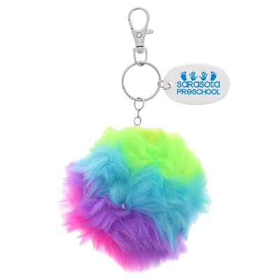 Fluffy rainbow pom keychain with one color customizable imprint.