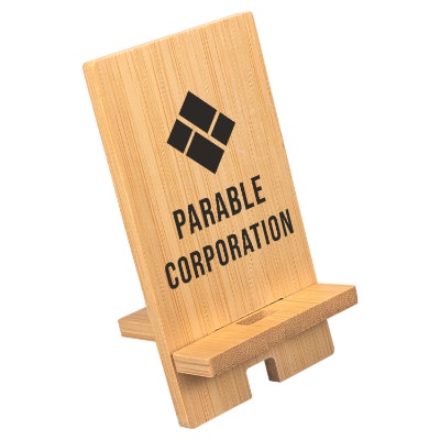 Bamboo phone stand with a custom logo.