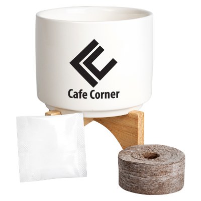 White ceramic personalized planter set.