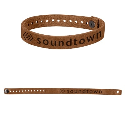 Debossed leather bracelet with a customized logo.