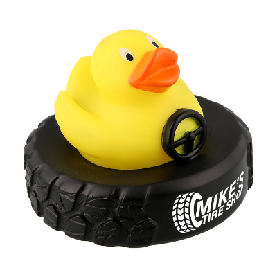 Yellow plastic rubber duck with a customized imprint.
