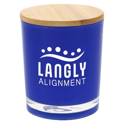 Blue glass candle with a personalized logo.