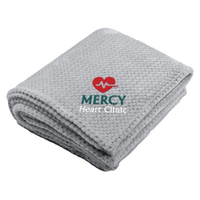 Gray plush textured blanket with custom logo.