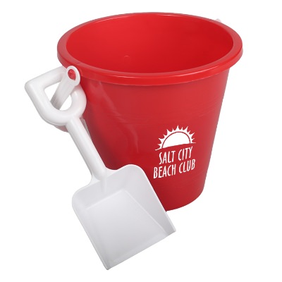 Red plastic sand pail and shovel with a branded logo.