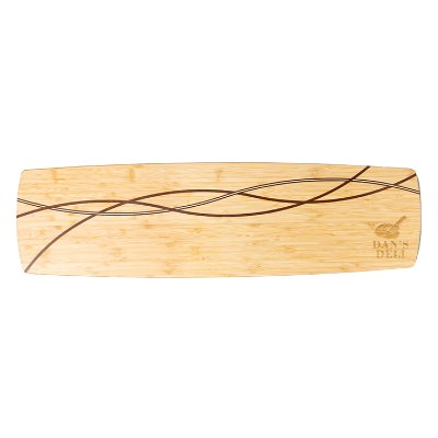 Lengthy bamboo charcuterie board with promotional laser engraved imprint.