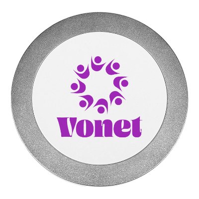 Aluminum wireless charger with a personalized logo.