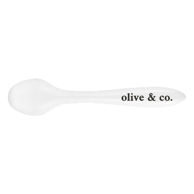 White plastic eye roller with a custom logo.