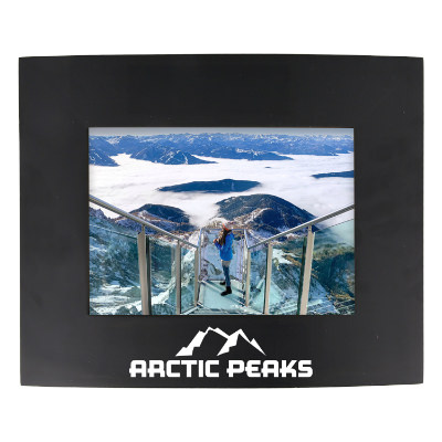 Black wooden picture frame with a branded imprint.