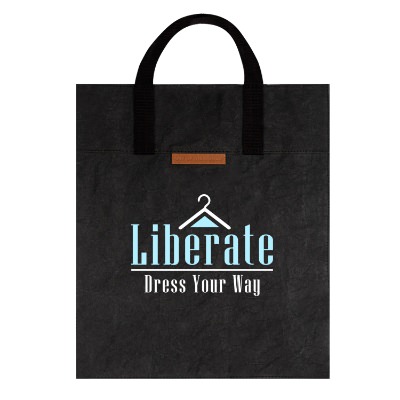 Black supernatural paper tote bag with custom full-color artwork.
