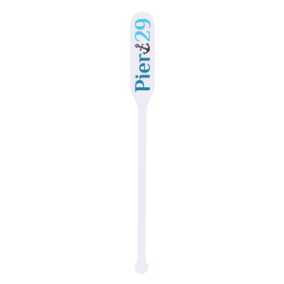 White plastic stir stick with a personalized logo.
