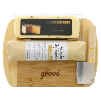Tan bamboo charcuterie board with a personalized logo.