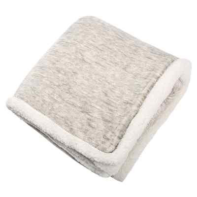 Tan and white blank sherpa blanket.