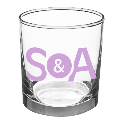 Clear whiskey glass with custom logo.