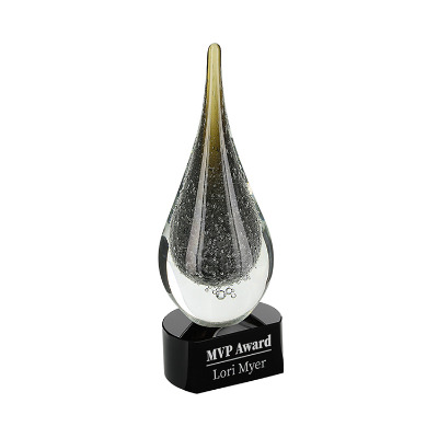 Glass award with custom laser engraved imprint.