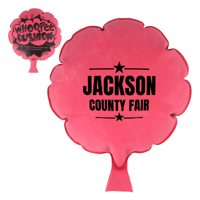 Red rubber whoopee cushion with a branded logo.
