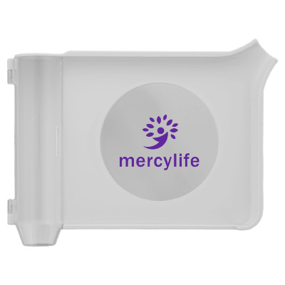 Plastic white pill tray with a personalized imprint.