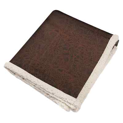 Brown leather throw blanket.