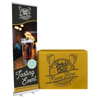 Custom polyester 4 foot demo height table cover and custom 24 inch banner stand trade show package.