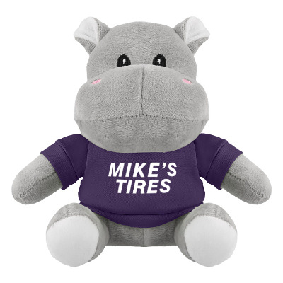 Plush and cotton hippo with a purple t-shirt with a personalized logo.