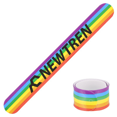 Rainbow silicone wristband with a branded logo.