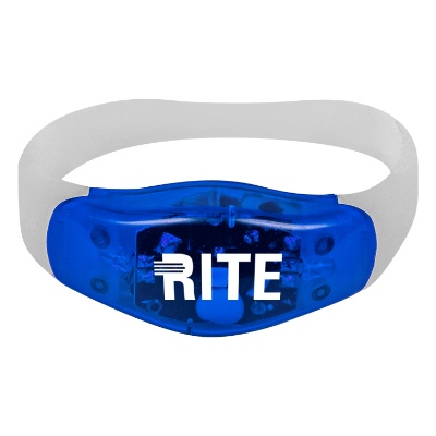 Silicone orange wristband with light and a custom logo.