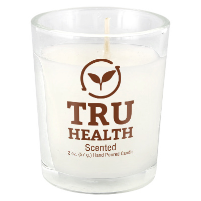 Clear glass candle with a branded imprint.