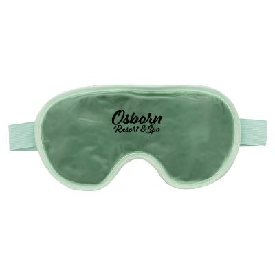 Plastic green hot and cold pack with a custom imprint.