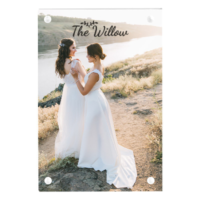 Clear acrylic picture frame with a custom imprint.