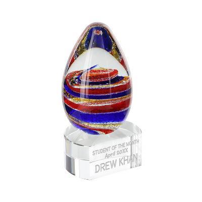Glass award with custom laser engraved imprint.