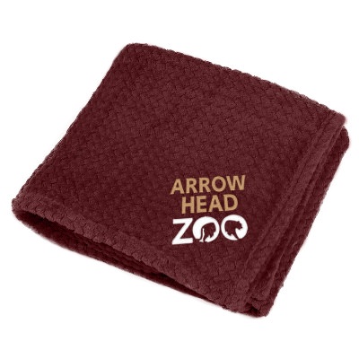 Cozy maroon plush blanket with custom design.