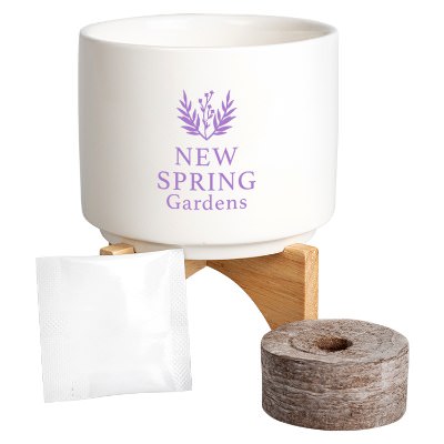 White ceramic personalized planter set.