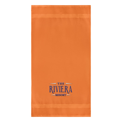 Orange beach towel with custom embroidered logo.