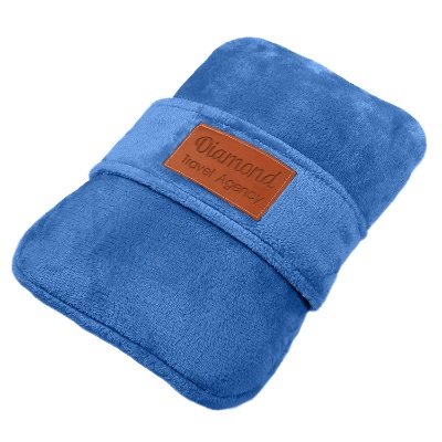 Blue travel pillow blanket with custom design.