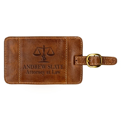 Custom debossed brown luggage tag.