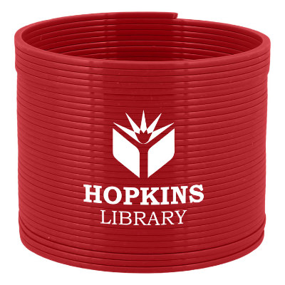 Red plastic coil spring with a personalized imprint.