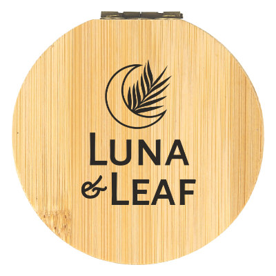 Bamboo sewing kit with a branded logo.