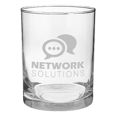 Clear whiskey glass with engraved logo.