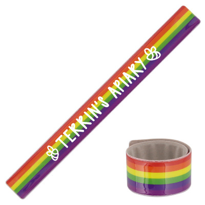 Rainbow vinyl wristband with a branded logo.
