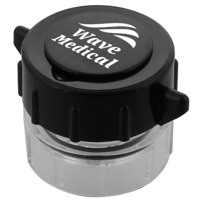 Black plastic pill crusher with a branded logo.