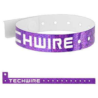 Purple vinyl wristband with a custom logo.