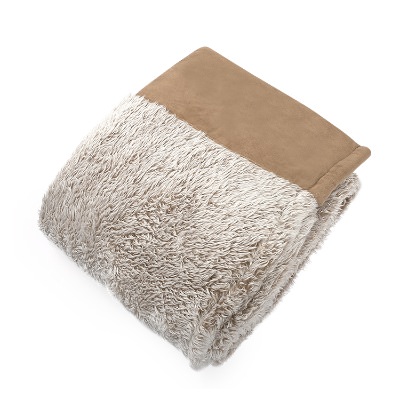 Super soft tan and cream blank plush blanket.
